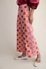 cropped wide leg pants in baby pink with colorful polka dots 