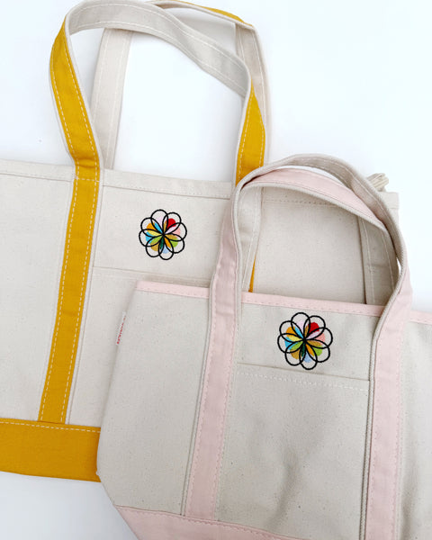 size reference for pink and mustard personify boat totes
