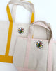 size reference for mustard and pink boat totes