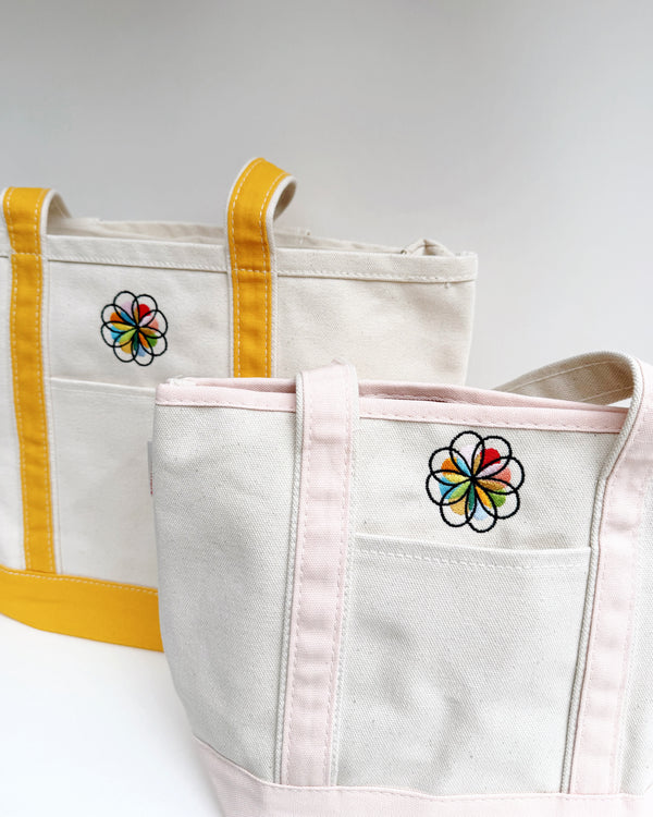 size reference for mustard and pink boat totes
