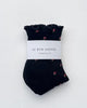 petal ruffled hugger crew socks in black 