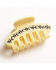 butter yellow hair claw with black rhinestone ants