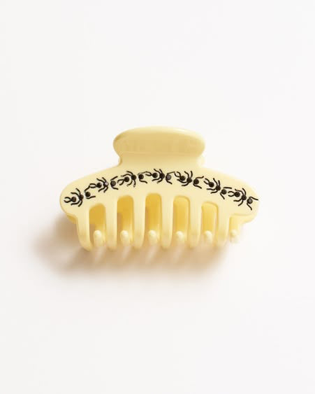 butter yellow hair claw with black rhinestone ants