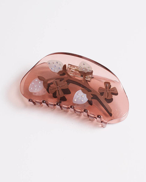 hair claw featuring bejeweled white pineberries