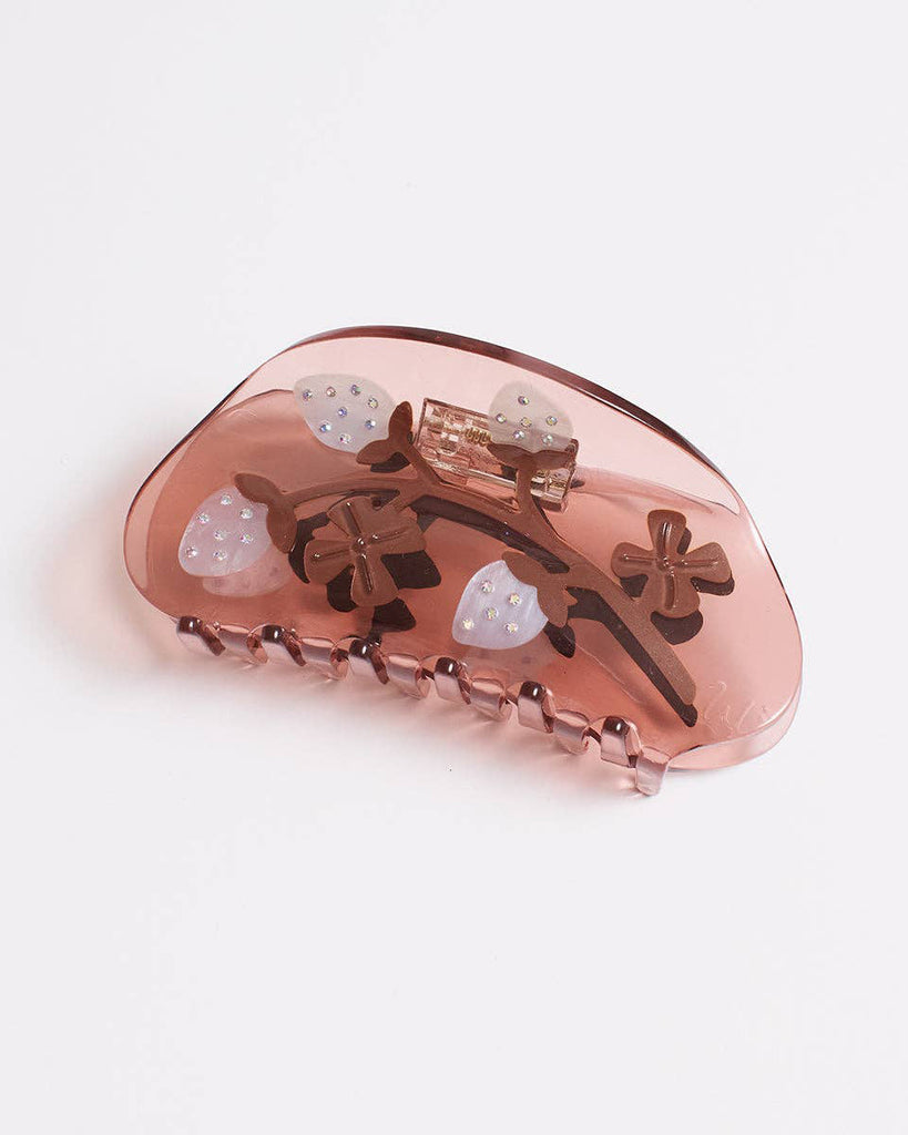 hair claw featuring bejeweled white pineberries