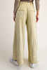 wide leg sweatpants in washed acid green with pockets and exposed seam detailing
