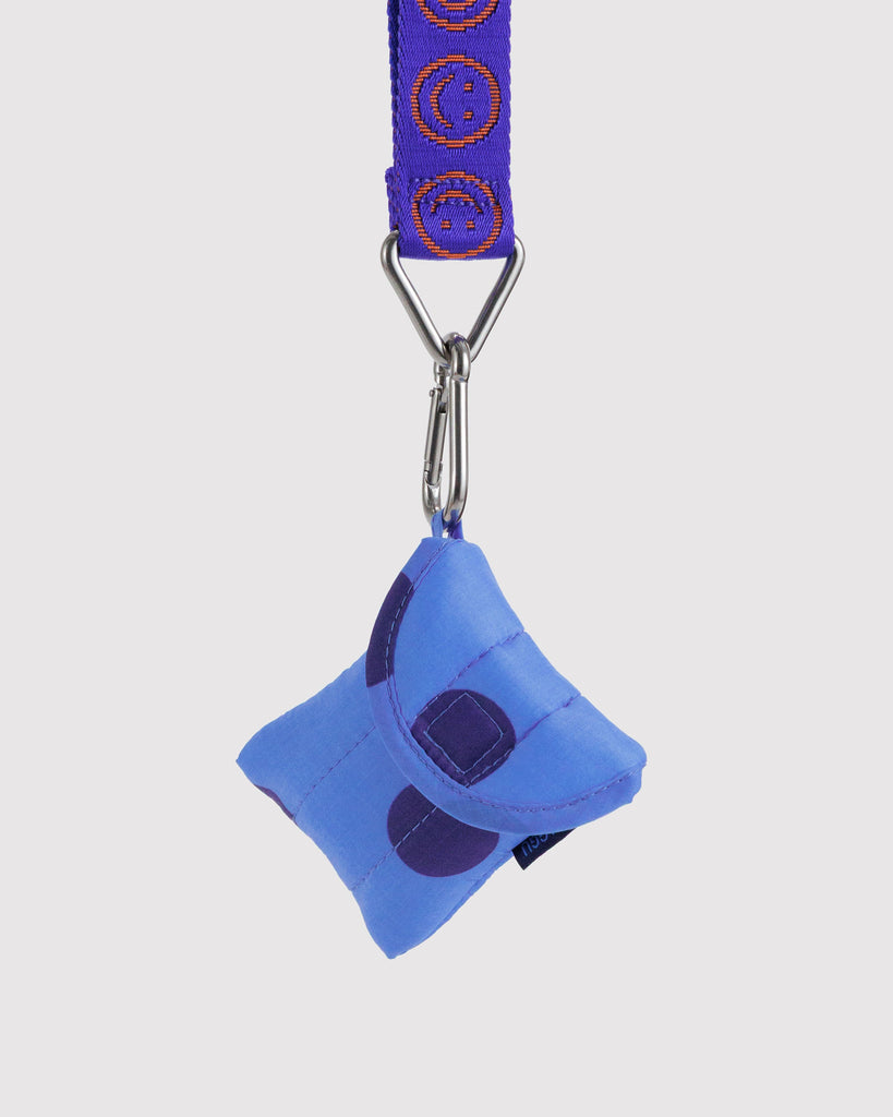 puffy earbuds case in a blue polka dot print