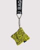 puffy earbuds case in chartreuse paisley