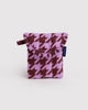 puffy earbuds case in a pink houndstooth print