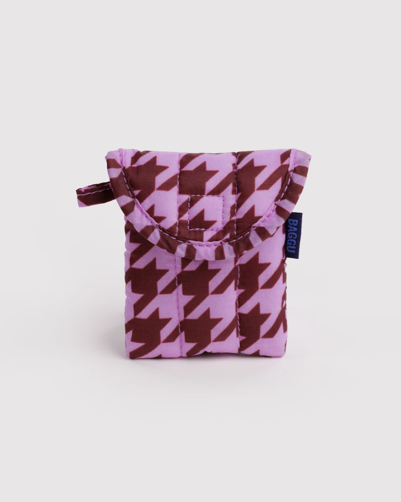 puffy earbuds case in a pink houndstooth print