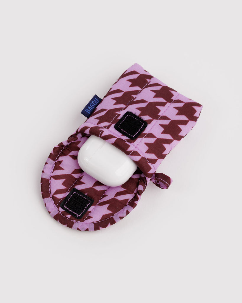 puffy earbuds case in a pink houndstooth print