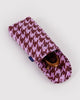 quilted glasses sleeve in a pink houndstooth pattern