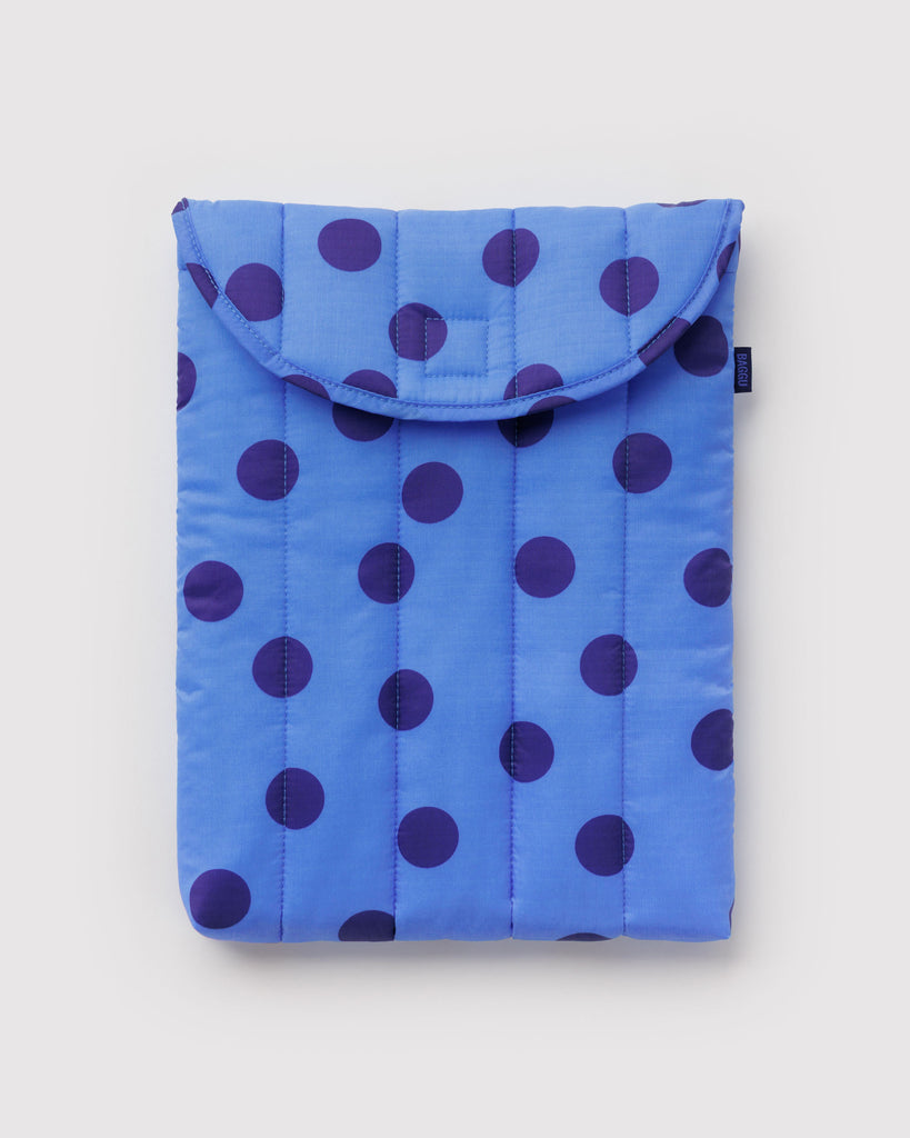 quilted laptop sleeve in a blue polka dot pattern