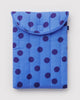 quilted laptop sleeve in a blue polka dot pattern