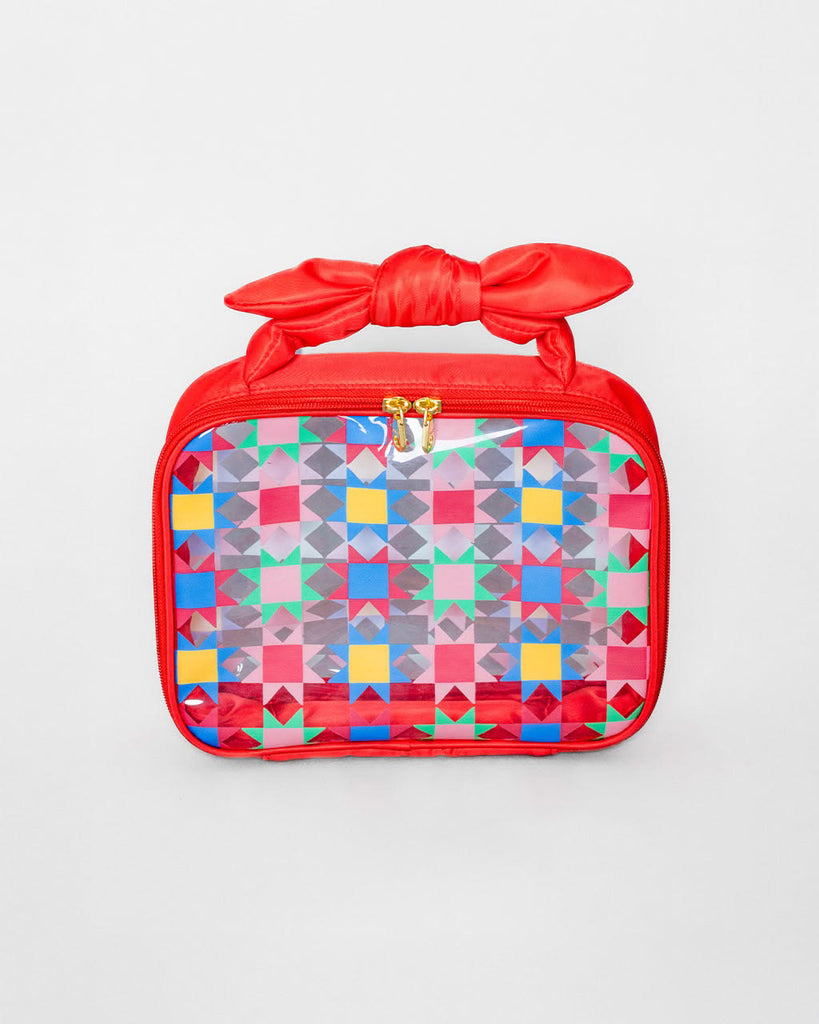 vinyl travel bag with a colorful quilt-inspired design