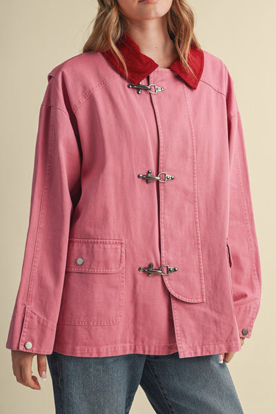 special utility jacket in rosy pink with a contrasting red collar.