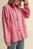 special utility jacket in rosy pink with a contrasting red collar.