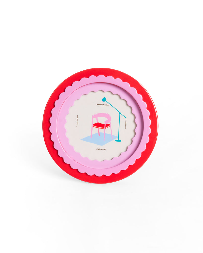 circular photo frame with a glossy finish