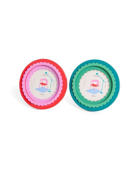 circular photo frame with a glossy finish