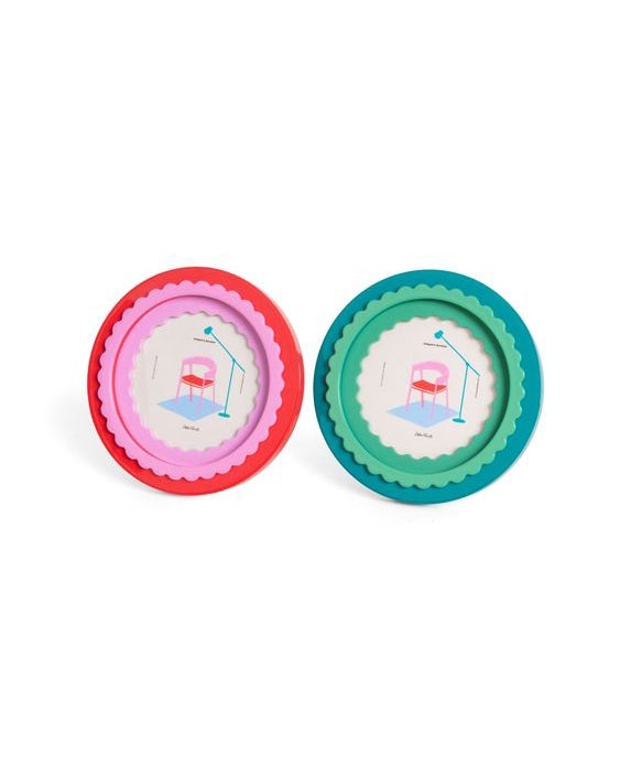 circular photo frame with a glossy finish