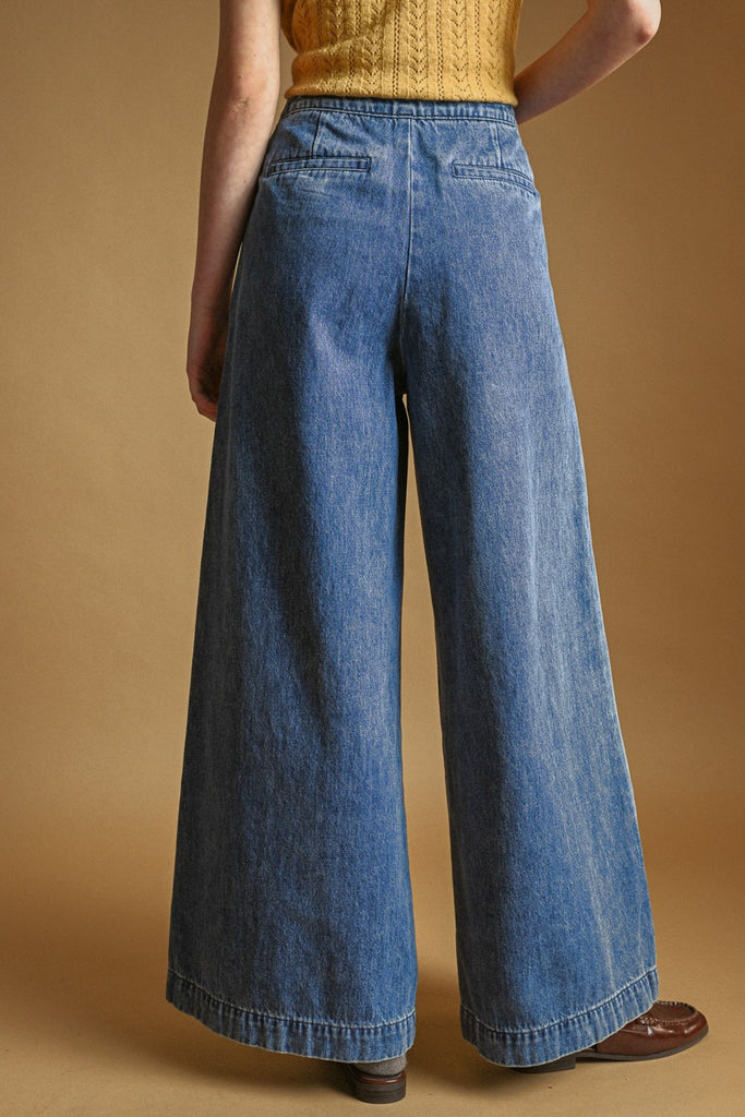 wide leg jeans with sailor-inspired side buttons