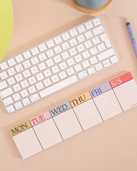 weekly planner pad designed to be used around your computer keyboard