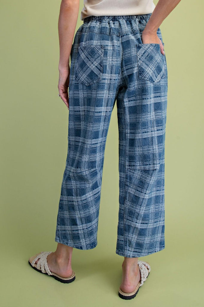 denim trousers in a blue plaid pattern