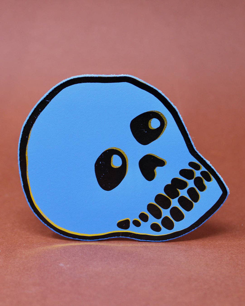 genuine leather skull coaster in cornflower blue