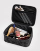 small cosmetic case in a charcoal ditsy floral pattern