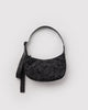 small nylon crescent bag from baggu in a charcoal colored ditsy floral pattern