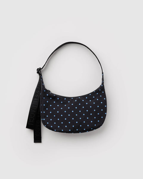 small nylon crescent bag from baggu in black with micro polka dots in sky blue