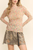 nude colored mesh top with a colorful polka dot pattern