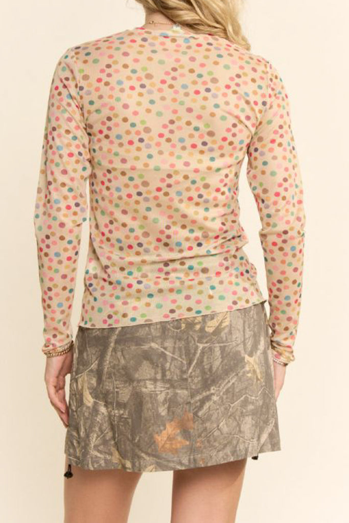 nude colored mesh top with a colorful polka dot pattern