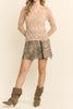 nude colored mesh top with a colorful polka dot pattern
