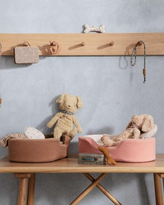 vintage-inspired dog plush in a soft sand color