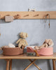vintage-inspired dog plush in a soft sand color