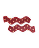 set of 2 hair clips with a squiggle design in cherry pie