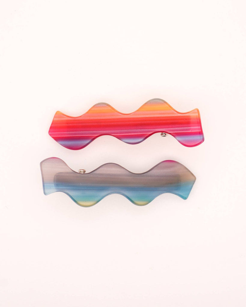 set of 2 hair clips with a squiggle design in sunset stripes