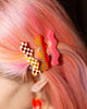set of 2 hair clips with a squiggle design 