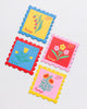 set of four leatherette coasters in the shape of colorful postage stamps