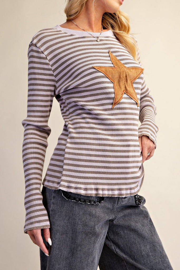 ribbed long sleeve top in muted brown and pale purple stripes with a star patch detail in tan