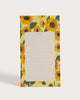 lined notepad with a sunflower pattern