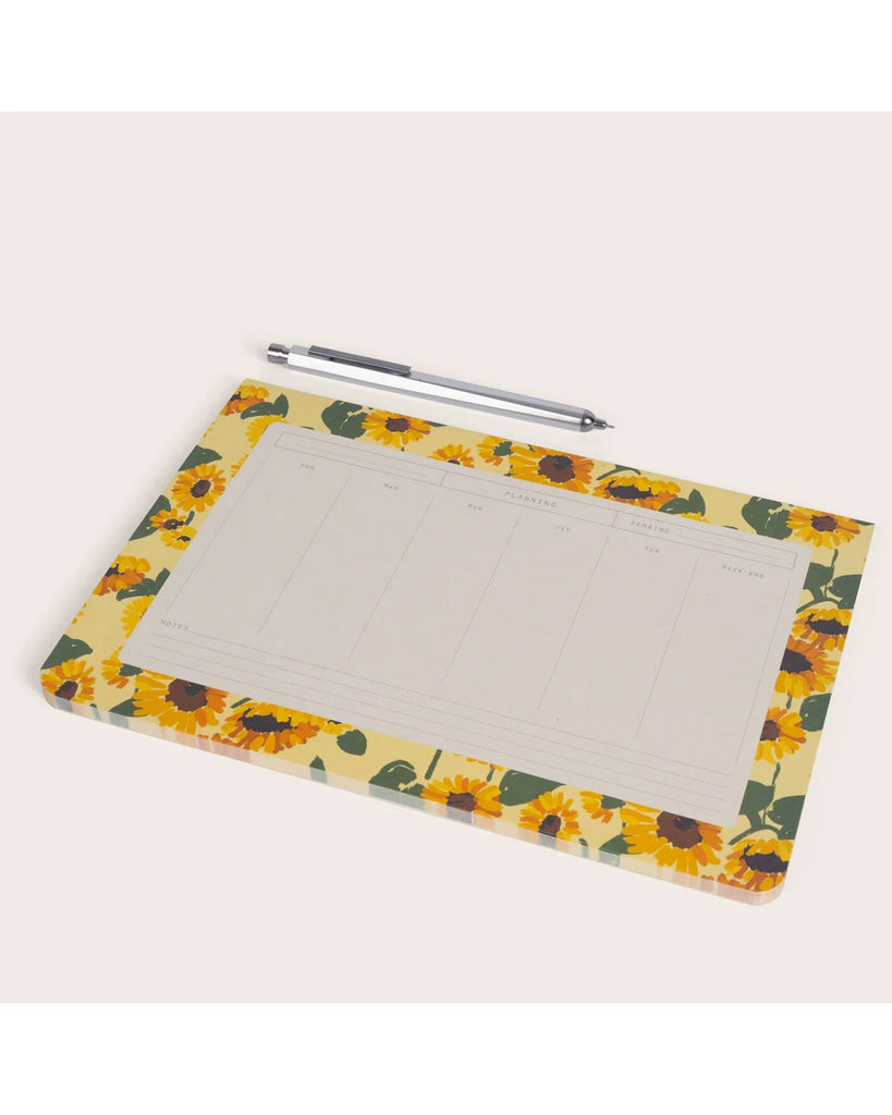 weekly desk planner with a sunflower design