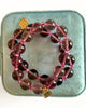 beaded bracelet featuring purple amethyst beads, pink seed beads, and gold-filled accents
