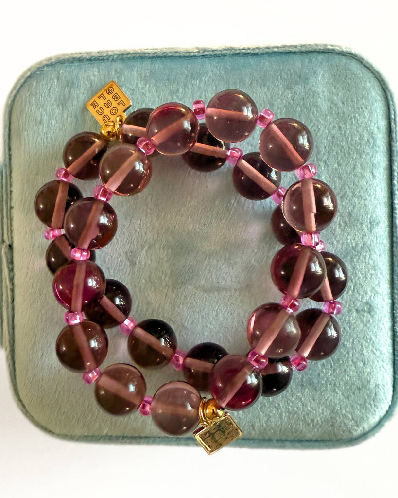 beaded bracelet featuring purple amethyst beads, pink seed beads, and gold-filled accents