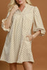 easy to wear midi dress in ecru with petite black polka dots throughout.
