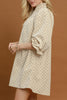 easy to wear midi dress in ecru with petite black polka dots throughout.