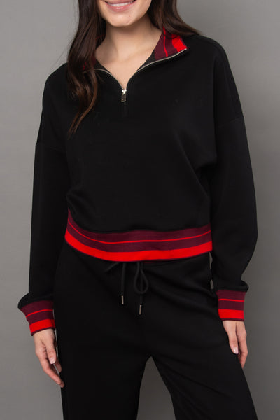 cozy black pullover with red racer stripe detailing.