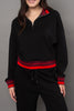 cozy black pullover with red racer stripe detailing.