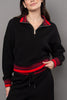 cozy black pullover with red racer stripe detailing.